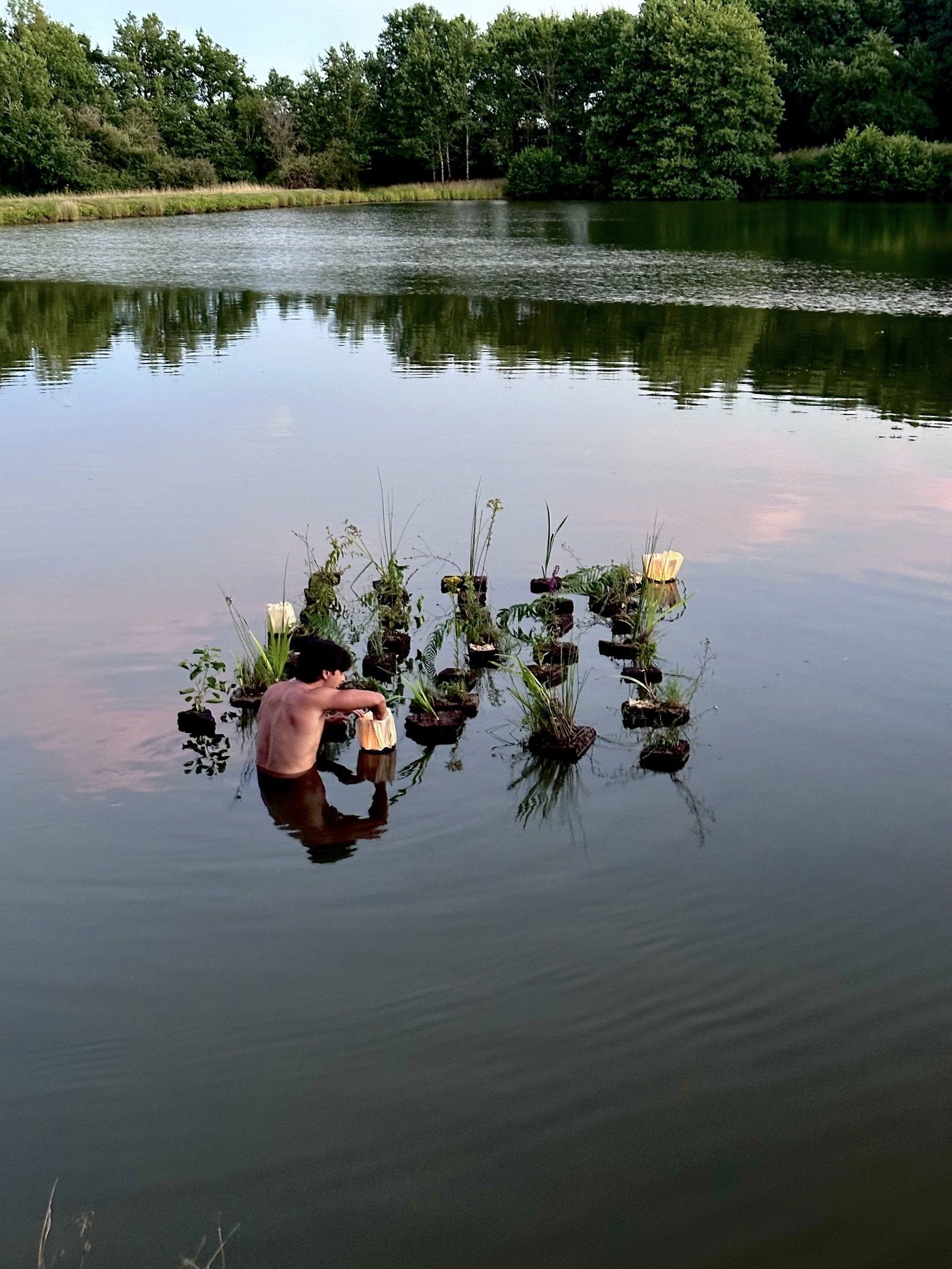 Several people assembling the floating structure