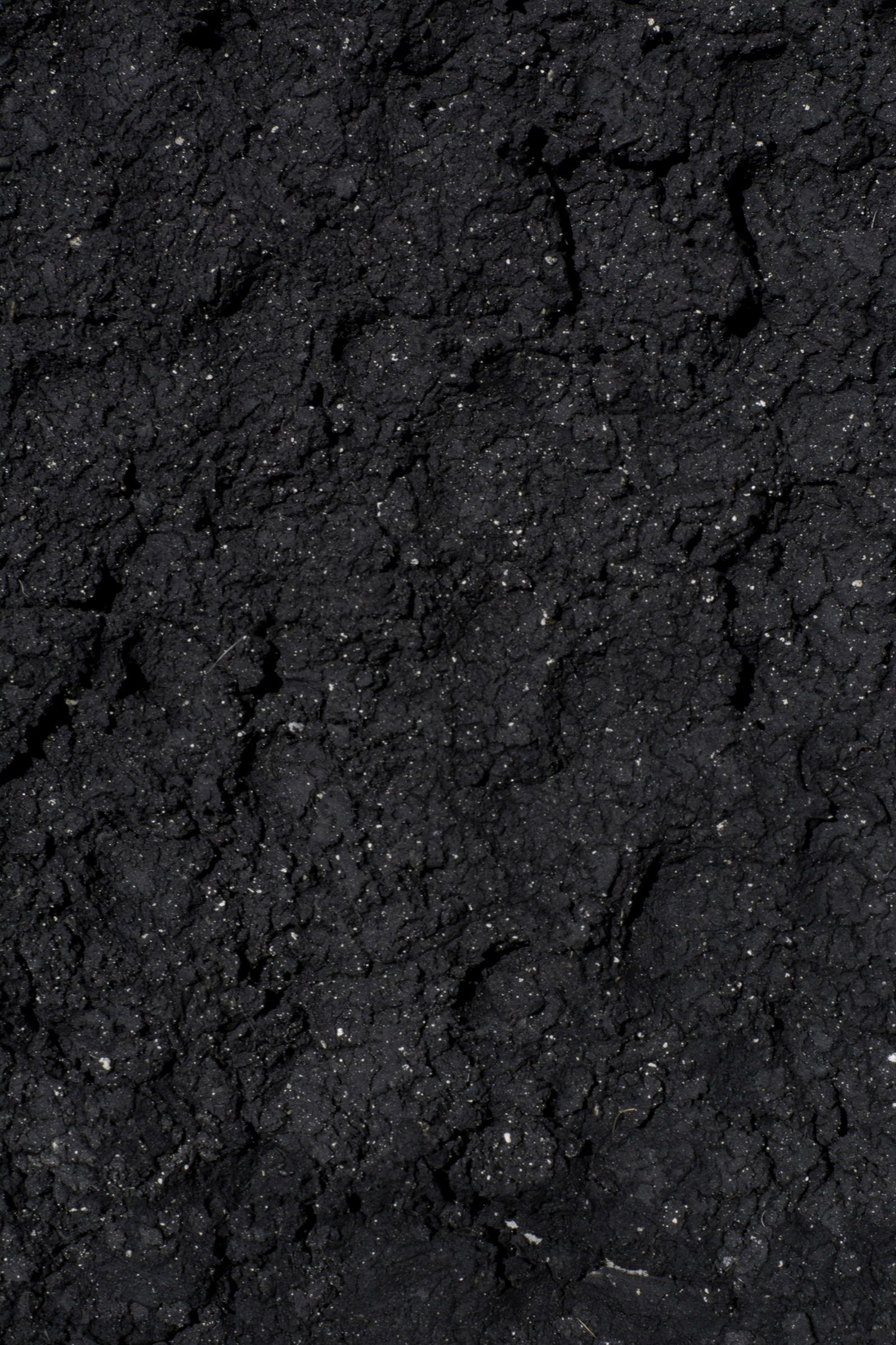 Dried Llobregat sludge in a block, before grinding