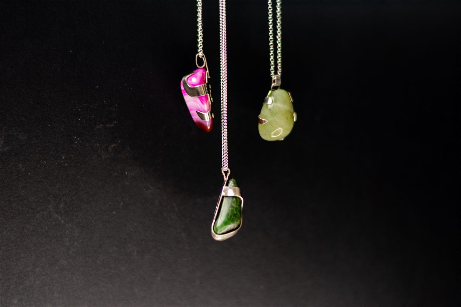 SUMAY jewellery: three hand-set pendants